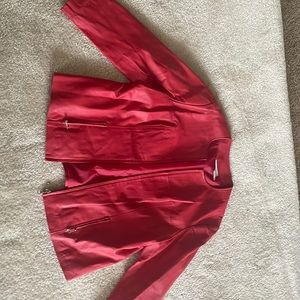 Women’s casual leather jacket in red size 16 gently worn zipper and front